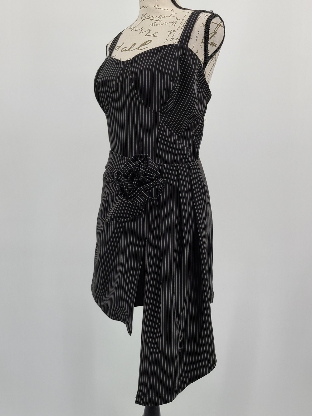 Anthropologie's Porridge Black Pinstripe Asymmetrical Romper Size Large